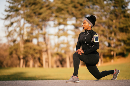 Woman exercising to support female reproductive health