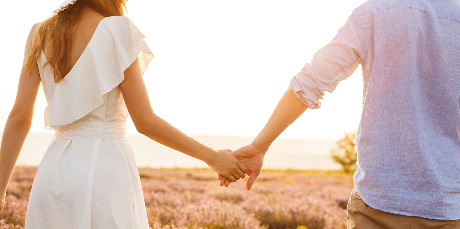 Couple holding hands